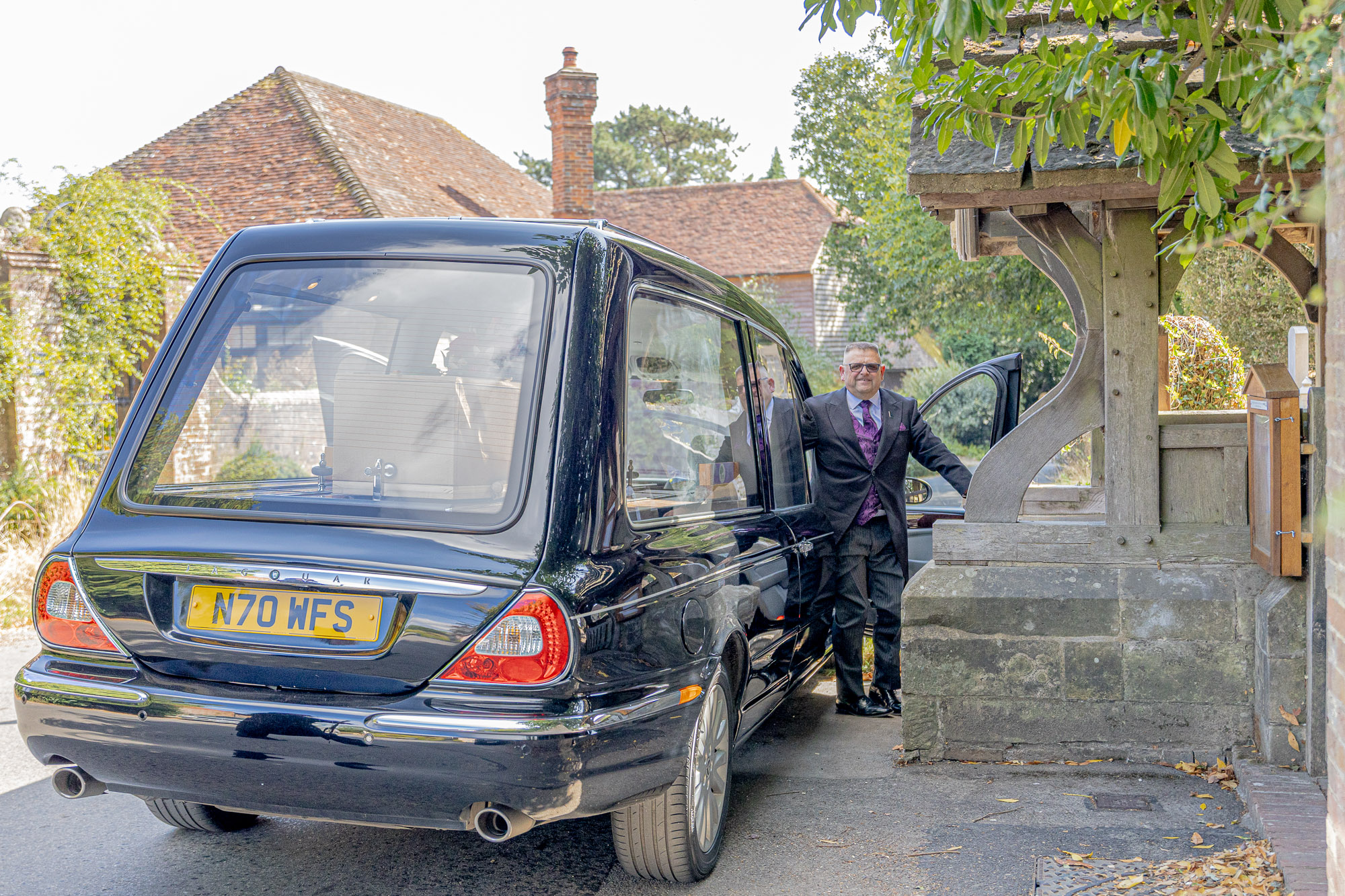 The Wealden hearse arriving at Waldron Church for a funeral service
