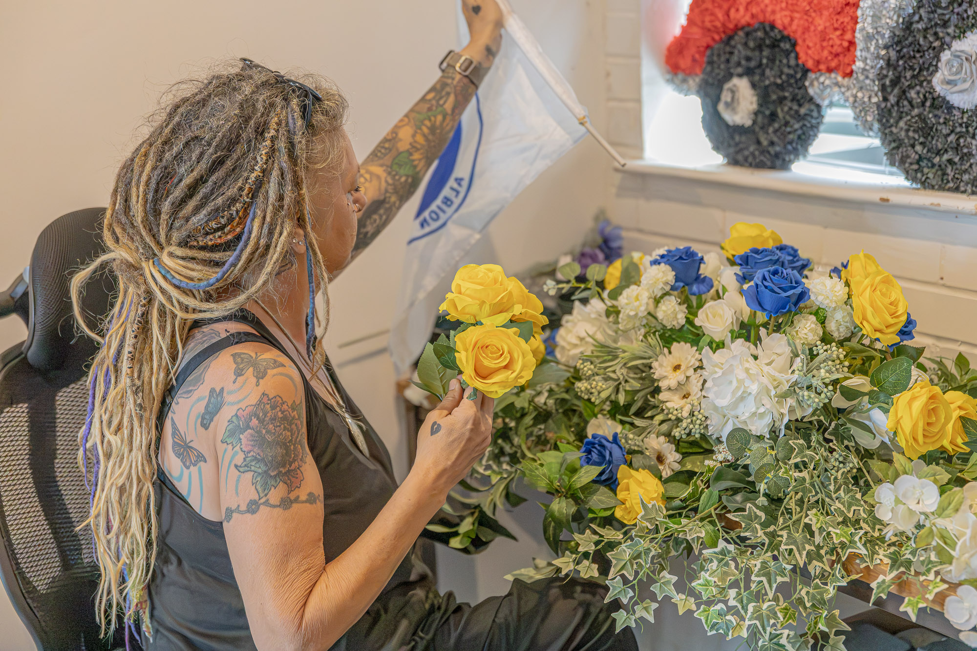 Seasonal flowers being arranged by the Wealden team