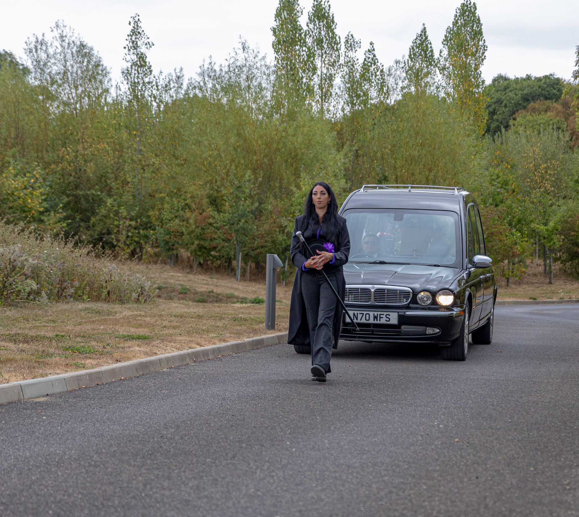 Stacie leading the Wealden Funeral Services hearse at the crematorium