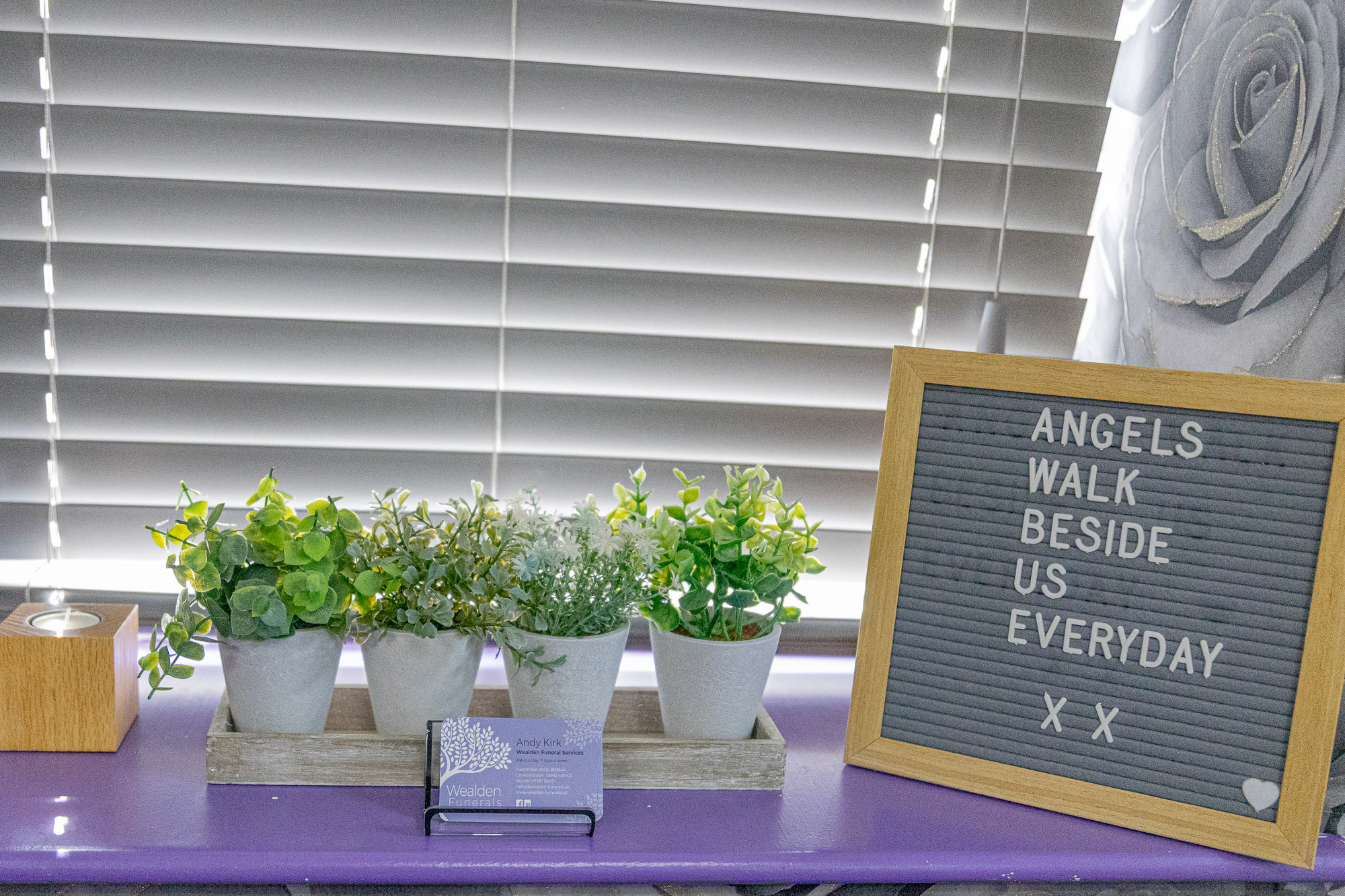 Flowers and a remembrance message on the windowsill in the private chapel